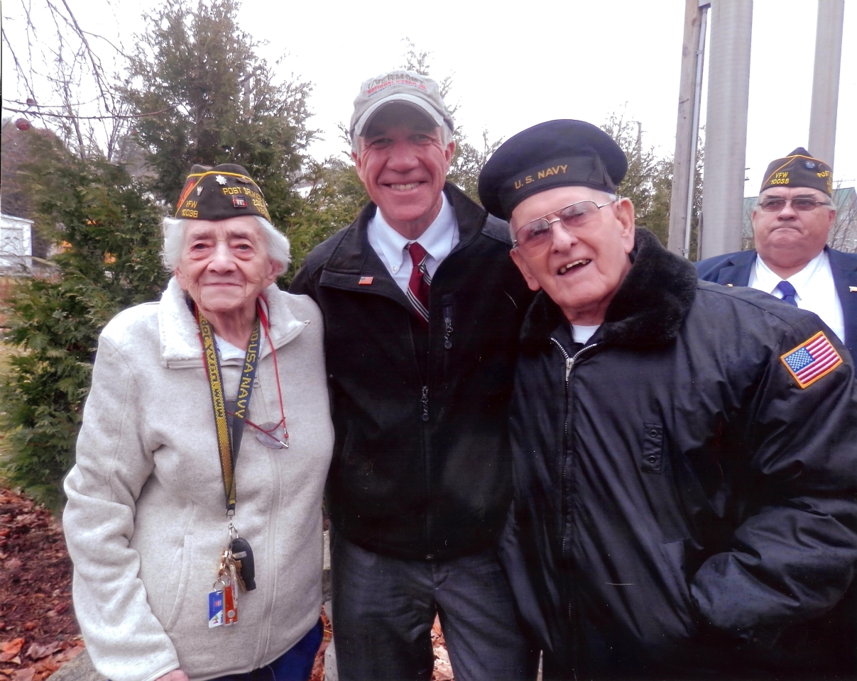 World War II Veteran Madeline Chaffee, Lt. Governor Phil Scott, World War II Veteran Larry King. Background Don Young.